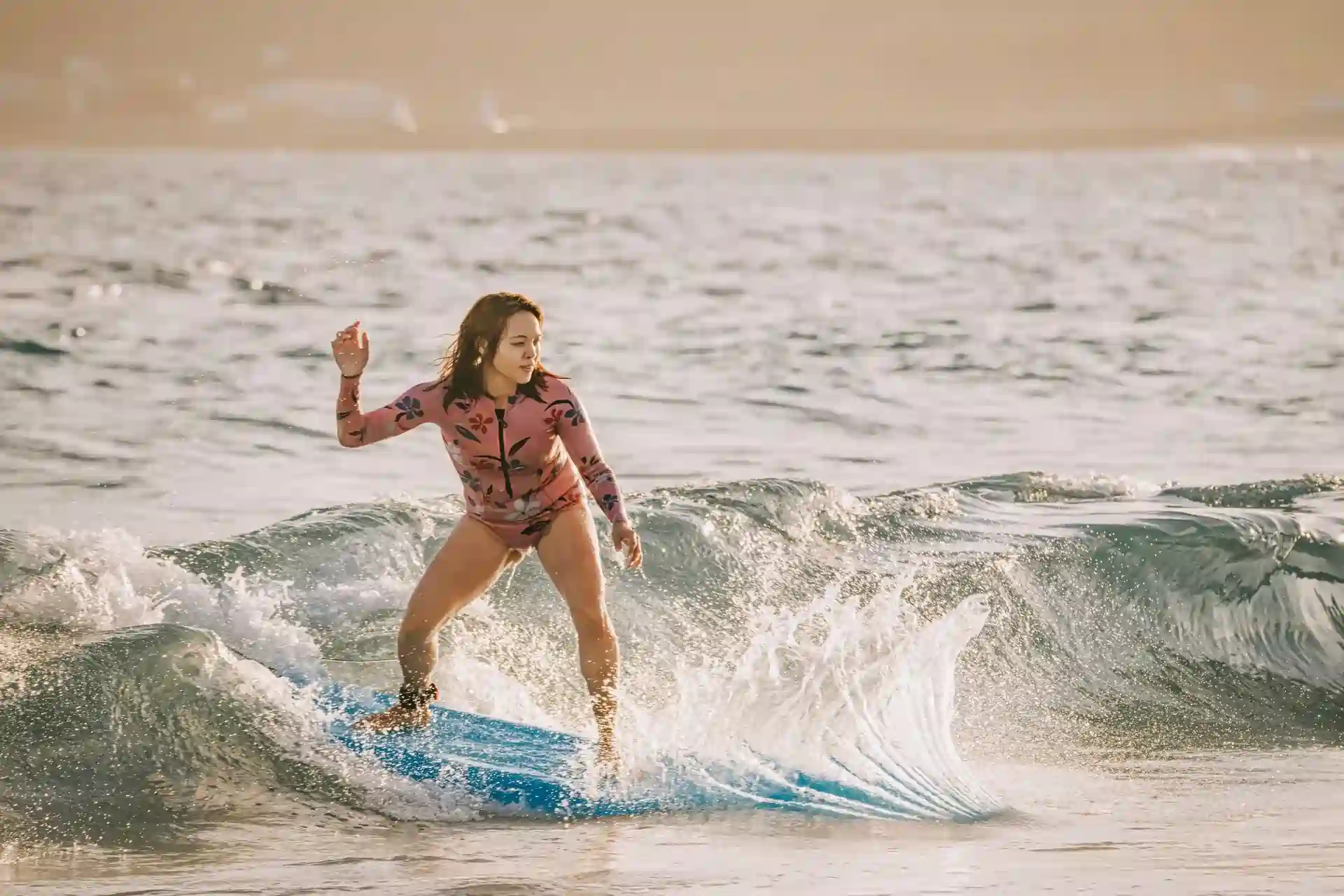 Women Balancing On Waves